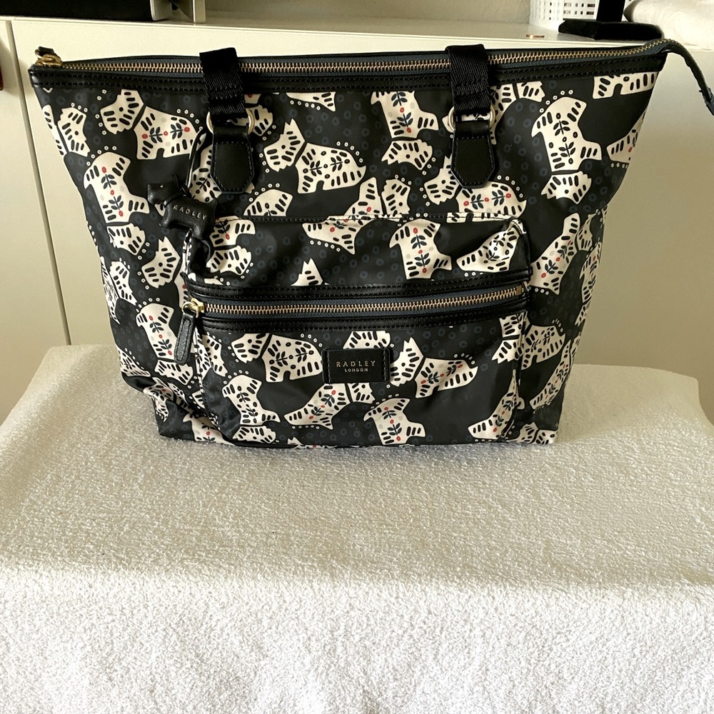 Radley London Large Zip-Top Tote Bag with laptop sleeve in navy print.